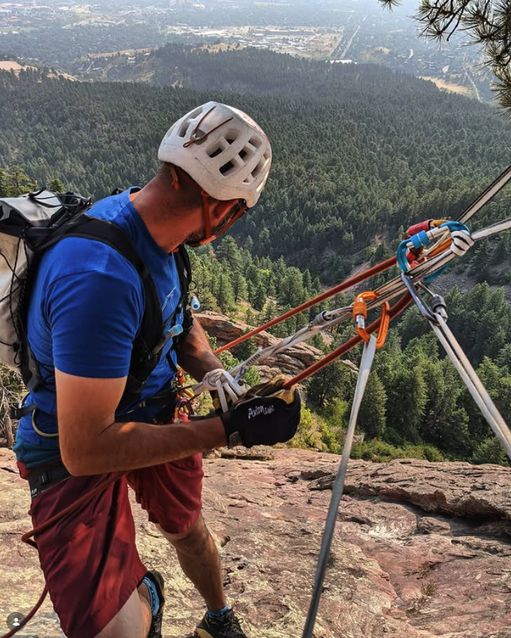 Gowtham managing ropes near the top of a climb