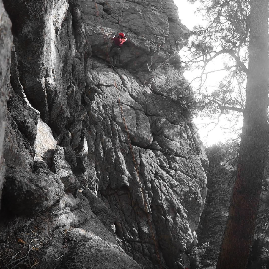 Gowtham rock climbing on granite